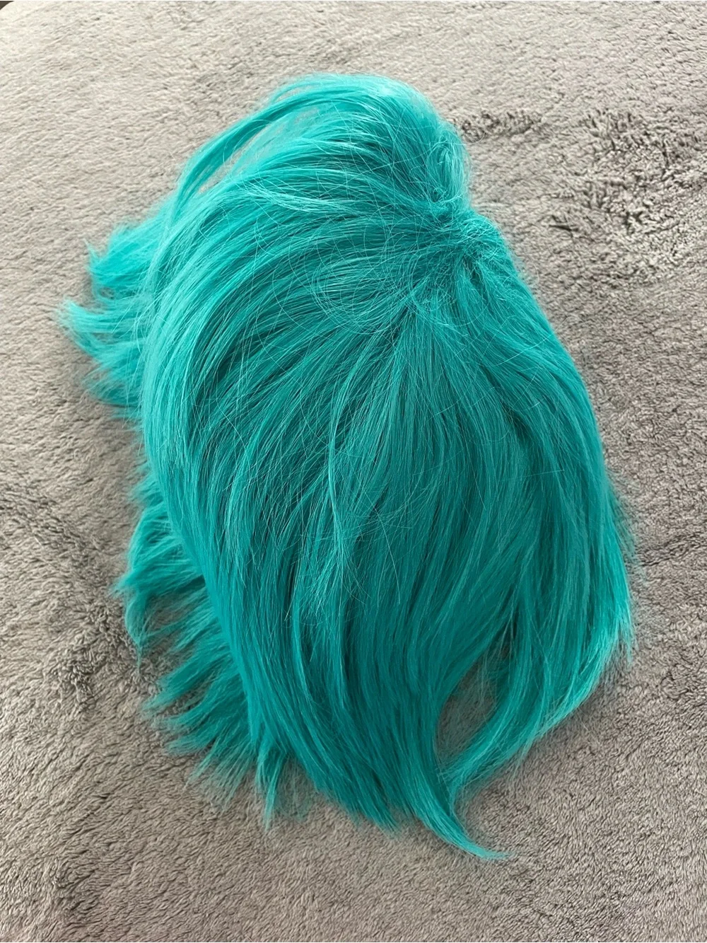 Hunigir vibrant teal